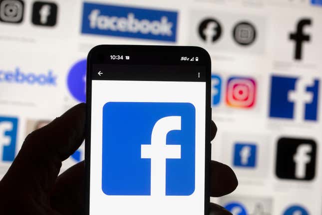 FILE - The Facebook logo is seen on a cell phone in Boston, USA, Oct. 14, 2022. The European Union said Tuesday April 30, 2024 that it&#39;s scrutinizing Facebook and Instagram over a range of suspected violations of the bloc&#39;s digital rulebook, including not doing enough to protect users from foreign disinformation ahead of EU-wide elections. (AP Photo/Michael Dwyer, File)