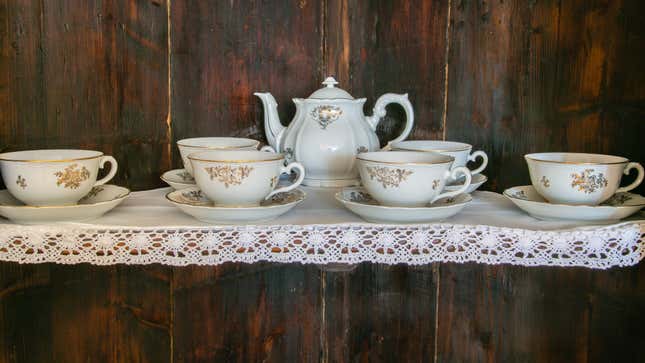 vintage china tea set on shelf