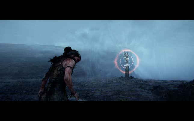 Senua approaches a glowing totem in a rainstorm.