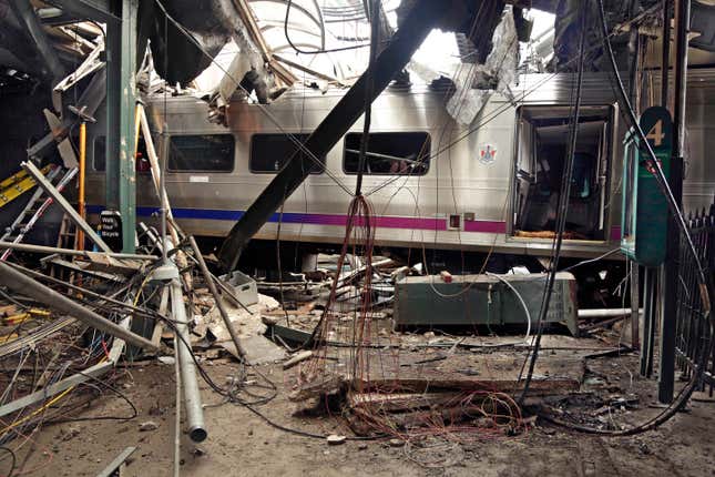 FILE – This photo provided by the National Transportation Safety Board, shows damage from a Sept. 29, 2016, commuter train crash that killed a woman and injured more than 100 people at the Hoboken Terminal in Hoboken, N.J. The National Transportation Safety Board issued a report Wednesday, Nov. 1, 2023, urging the Federal Railroad Administration and the industry to keep developing new technology that can be used to improve Positive Train Control systems. But their recommendations include at least one practical idea that railroads could likely implement relatively quickly. (Chris O&#39;Neil/National Transportation Safety Board via AP, File)