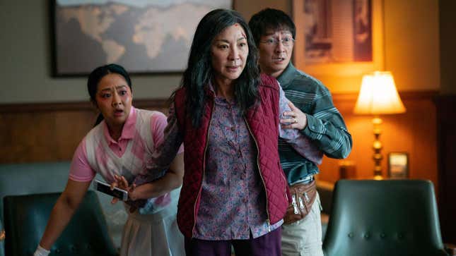 A mom (Michelle Yeoh) protects her family in Everything Everywhere All at Once.