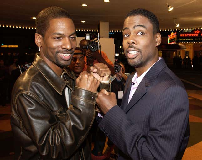 Chris Rock (R) and his brother Tony attend the premiere of the DreamWorks film “Head of State” on March 26, 2003 in Westwood, California.