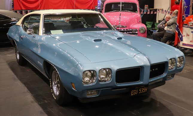 A 1971 Pontiac GTO in blue in a museum