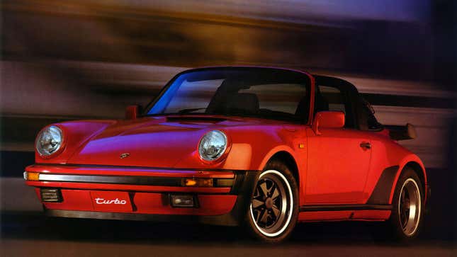 A photo of a red, 1987 Porsche 911. 