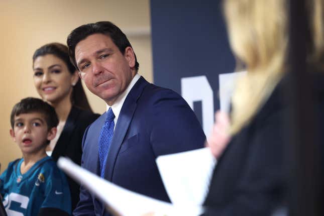 BETTENDORF, IOWA - DECEMBER 18: Republican presidential candidate Florida Governor Ron DeSantis, with his family by his side, speaks to guests during the Scott County Fireside Chat at the Tanglewood Hills Pavilion on December 18, 2023 in Bettendorf, Iowa. Iowa Republicans will be the first to select their party’s nomination for the 2024 presidential race when they go to caucus on January 15, 2024. 