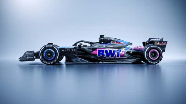 A side image of the black and pink Alpine F1 car.