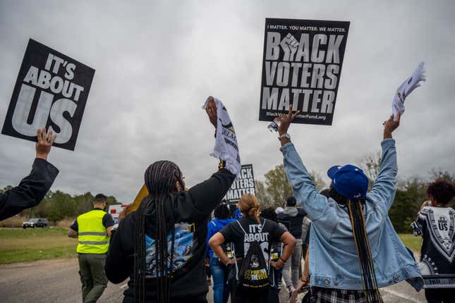 Marchers lead chants during the Black Voters Matter’s 57th Selma to Montgomery march on March 09, 2022, in Selma, Alabama. People gathered alongside organizations: Black Voters Matter, Rainbow PUSH Coalition, and the Transformative Justice Network to march the 11-mile original route that the late U.S. Rep. John Lewis and other civil rights leaders marched on March 7, 1965.