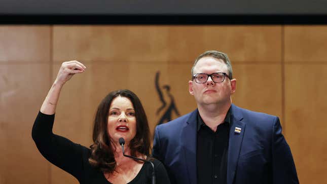 SAG-AFTRA President Fran Drescher (L) speaks as SAG-AFTRA National Executive Director Duncan Crabtree-Ireland looks on at a press conference discussing their strike-ending deal with the Hollywood studios on November 10, 2023 in Los Angeles, California. 