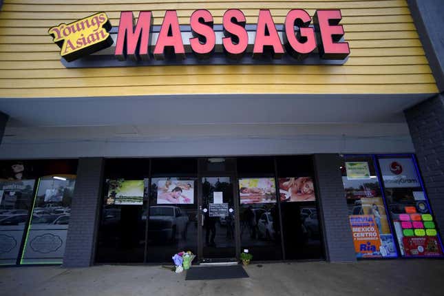 In this Wednesday, March 17, 2021 file photo, A make-shift memorial is seen outside a business where a multiple fatal shooting occurred on Tuesday, in Acworth, Ga.
