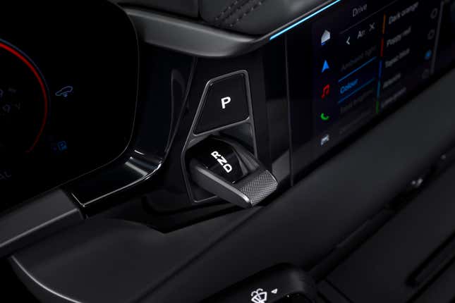 The dash-mounted shifter of a Porsche Macan EV