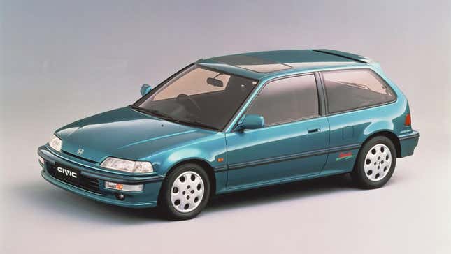 Overhead, front-quarter view of a 1991, Japanese-market Honda EF Civic hatchback in teal.