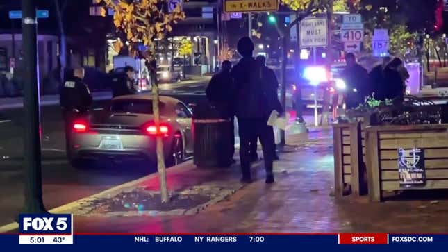 Screenshot from the original reporting showing police surrounding the victim's Porsche 718 Boxster after the attempted carjacking failed.