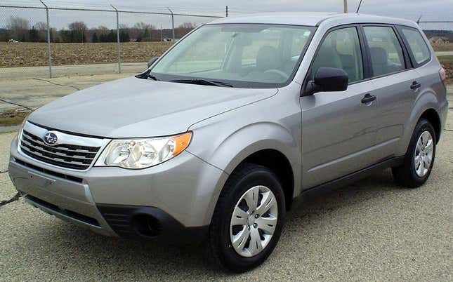 A 2008 Subaru Forester in grey looking very drab