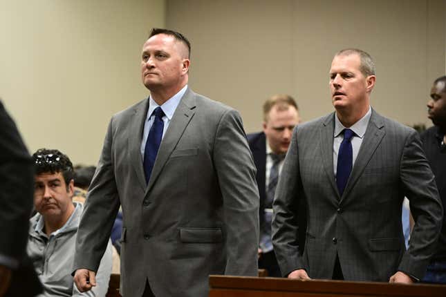  Paramedics Jeremy Cooper, left, and Peter Cichuniec, right, at an arraignment in the Adams County district court at the Adams County Justice Center January 20, 2023. 