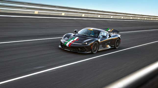 A black Pininfarina Battista at a test track