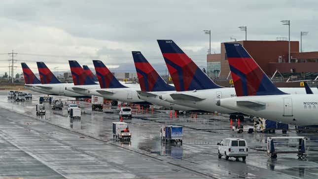 FILE - Delta planes are shown at their gates June 13, 2022, at Salt Lake City International Airport, in Salt Lake City. Major airlines including United Airlines, Delta and American expect fuel costs to keep rising through the end of the year, putting a dent in profits for an industry that has seen earnings growth in 2023. (AP Photo/Rick Bowmer, File)