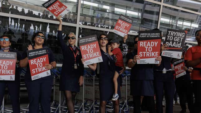 American Airlines flight attendants, represented by the Association of Professional Flight Attendants (APFA) on a picket line