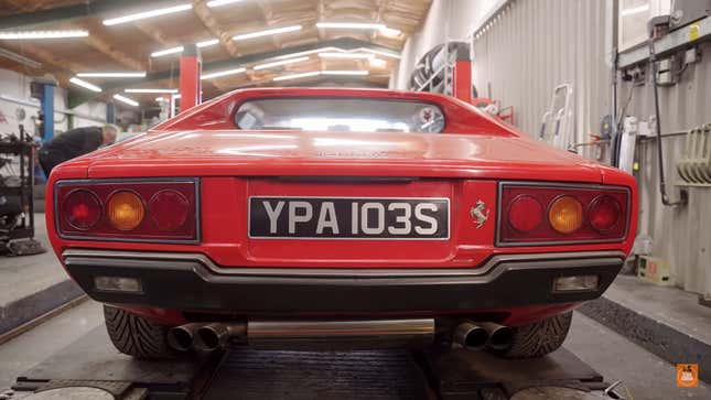 A photo of the rear end of a Ferrari Dino. 