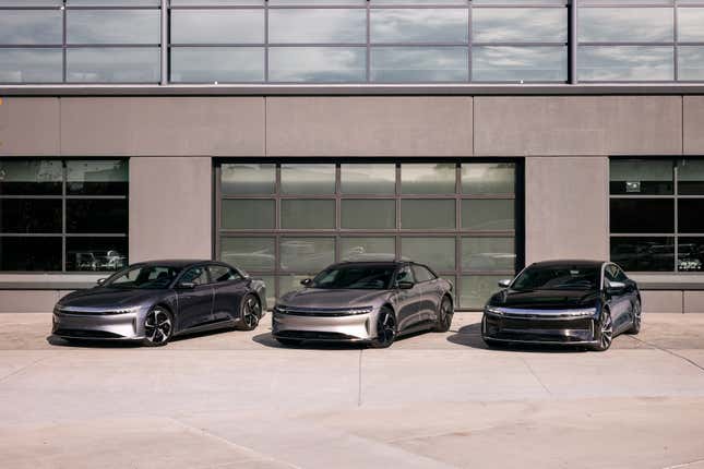 Front 3/4 view of three Lucid Air sedans