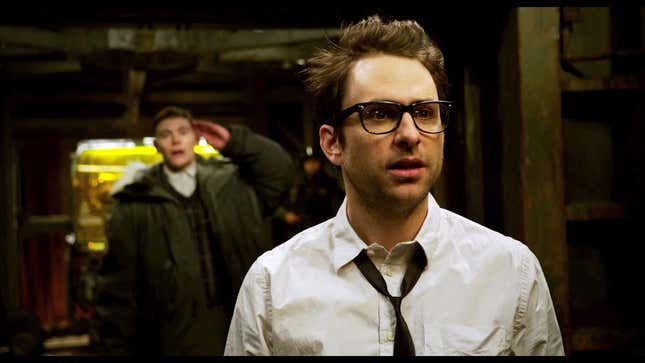 Charlie Day in Pacific Rim, with Burn Gorman saluting in the background. 
