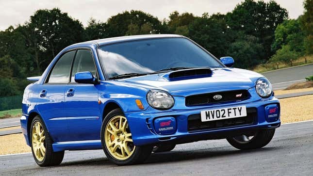 A photo of a blue Subaru WRX sedan. 