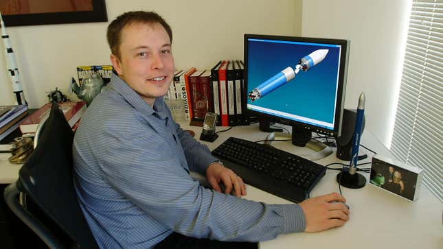 A 2004 photo of Elon Musk at a computer looking at a photo of a rocket 