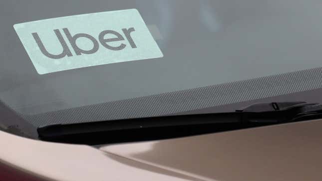 Uber sign is seen on a car in New York, U.S., April 12, 2019.