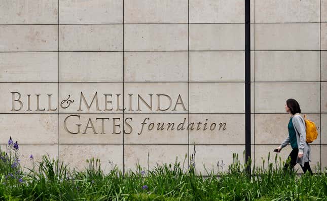 FILE - A person walks by the headquarters of the Bill and Melinda Gates Foundation on April 27, 2018, in Seattle. The Bill &amp; Melinda Gates Foundation threw its weight behind a call to save the lives of women in child birth and their children on Wednesday, Sept. 20, 2023, at its annual Goalkeepers conference on the side lines of the U.N. General Assembly in New York. (AP Photo/Ted S. Warren, File)