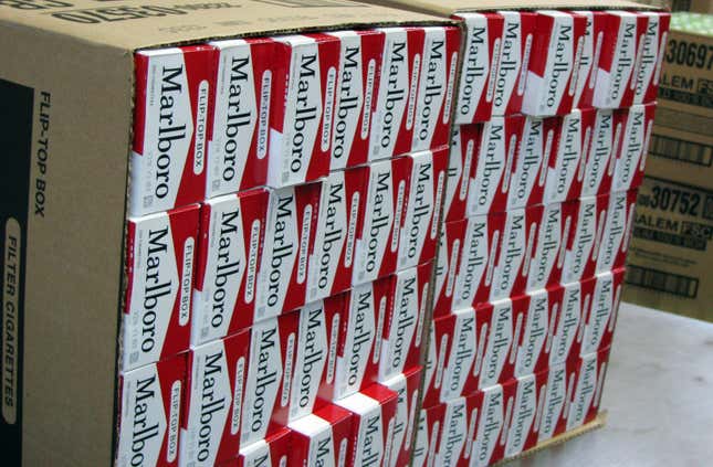 This July 29, 2013, photo shows a case of freshly-stamped Marlboro cigarette cartons at M. Amundson Cigar &amp; Candy Co. in Minneapolis. Smokers in Minneapolis will pay some of the highest cigarette prices in the country after the City Council voted unanimously Thursday, april 25, 2024 to impose a minimum retail price of $15 per pack to promote public health. (Mark Zdechlik/Minnesota Public Radio via AP, file)