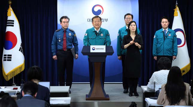 South Korean Interior and Safety Minister Lee Sang-min, center, speaks during a joint government briefing at the government complex in Seoul, South Korea, Wednesday, Feb. 21, 2024. South Korea on Wednesday officially ordered thousands of striking doctors to return to work immediately, a step that could lead to legal punishments if the doctors don&#39;t end their walkouts, which have caused numerous cancellations of surgeries and other treatments at hospitals. (Kim Do-hoon/Yonhap via AP)