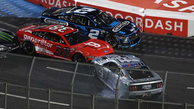 Kevin Harvick, driver of the No. 4 Busch Light Ford, spins after an on-track incident in front of Todd Gilliland, driver of the No. 38 gener8tor Skills Ford, and Austin Cindric, driver of the No. 2 Freightliner Ford, during the NASCAR Clash at the Coliseum. Gilliland was one of two drivers to run out of fuel during the race.