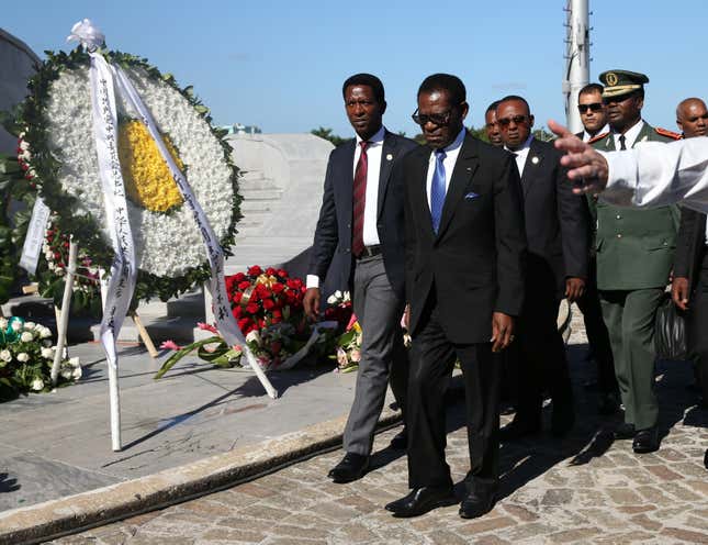 President of Equatorial Guinea Teodoro Obiang Nguema Mbasogo (wearing blue tie) arrives to pay tribute to Cuba's late President Fidel Castro at the Jose Marti Memorial in Revolution Square in Havana, Cuba