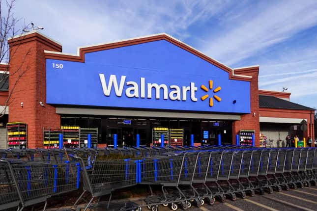 Shopping-cart-filled exterior of a Walmart store