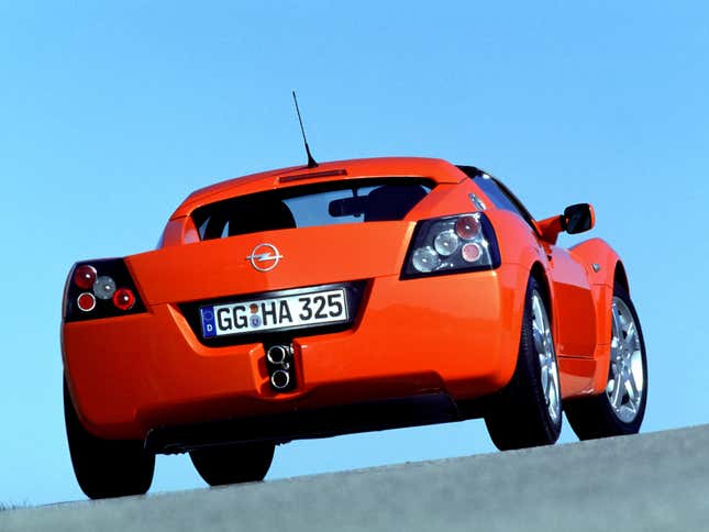 Rear 3/4 view of an orange Opel Speedster