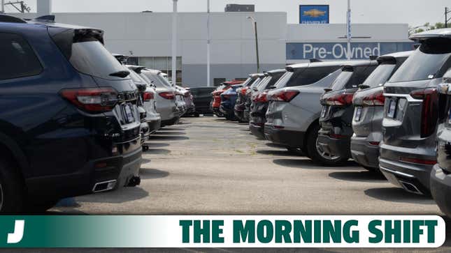 A photo of cars lined up at a dealer in America. 