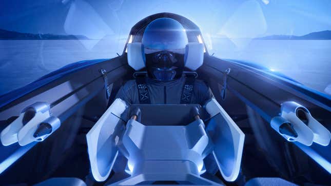 A driver sitting in the Renault Filante Record 2025 Concept