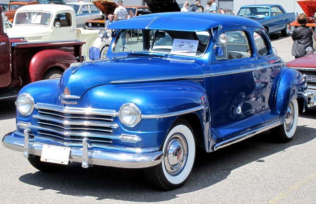 A blue 1947 Plymouth Special Deluxe Club Coupe photographed in Sault Ste. Marie, Ontario, Canada.