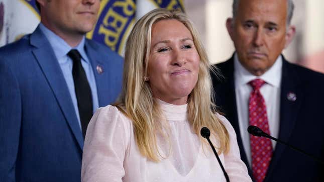 Rep. Marjorie Taylor Greene, R-Ga., joined at left by Rep. Matt Gaetz, R-Fla., and Rep. Louie Gohmert, R-Texas, speaks at a news conference about the treatment of people being held in the District of Columbia jail who are charged with crimes in the Jan. 6 insurrection, at the Capitol in Washington, Tuesday, Dec. 7, 2021. 