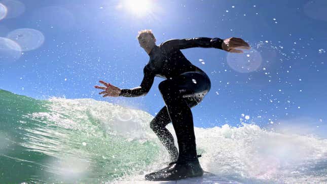 Man surfing in the sun