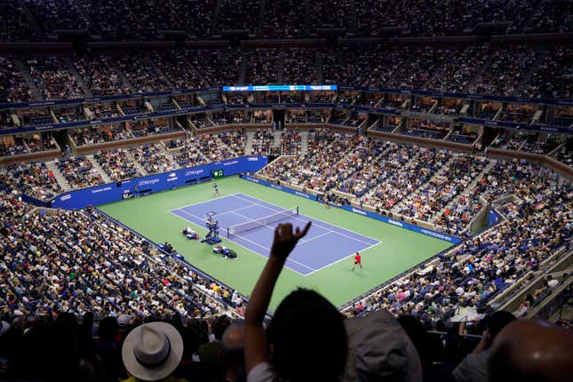 FILE - Novak Djokovic, of Serbia, left, returns against Jenson Brooksby, of the United States, play during a fourth round match at the U.S. Open tennis championships in Arthur Ashe Stadium, Monday, Sept. 6, 2021, in New York. Tennis could be on the verge of massive structural change if separate proposals formulated by the four Grand Slam tournaments and the WTA and ATP professional tours can succeed. (AP Photo/John Minchillo, File)