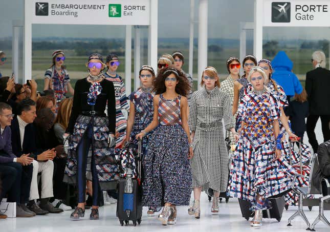 Models wear creations for Chanel's Spring-Summer 2016 ready-to-wear fashion collection presented during the Paris Fashion Week, Tuesday, Oct. 6, 2015 in Paris, France. (AP Photo/Francois Mori)