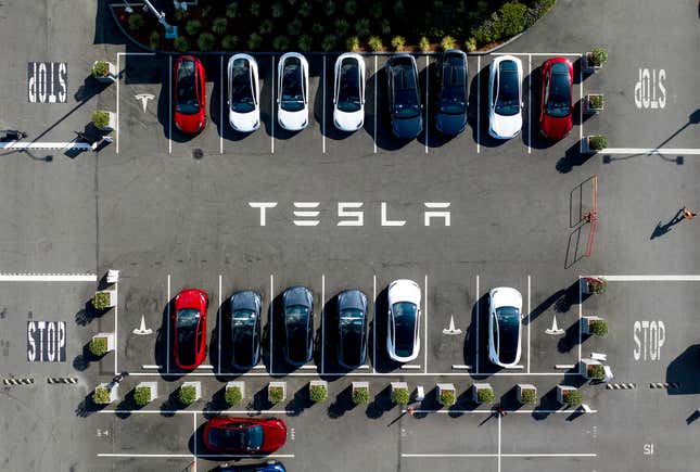 FILE - Tesla vehicles line a parking lot at the company&#39;s Fremont, Calif., factory, on Sept. 18, 2023. The Swedish Transport Agency on Monday, Nov. 27, 2023, reportedly was sued by Tesla because the company does not get access to registration plates for new cars. (AP Photo/Noah Berger, File)