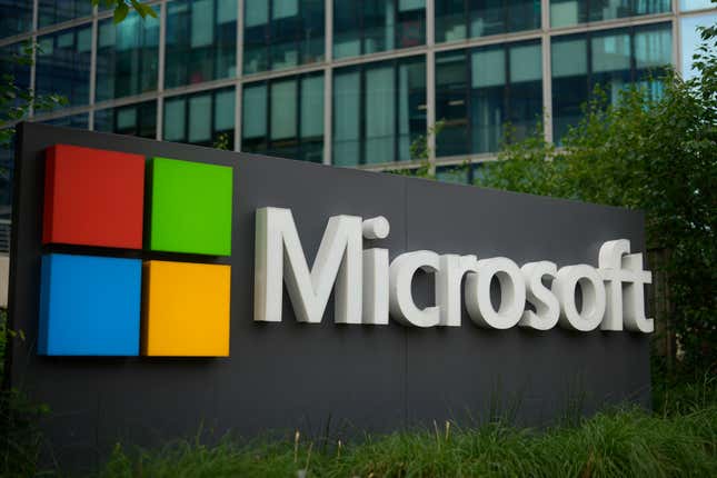 The Microsoft logo is displayed outside its headquarters in France