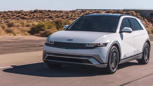 A white 2025 Ioniq 5 driving on a freeway