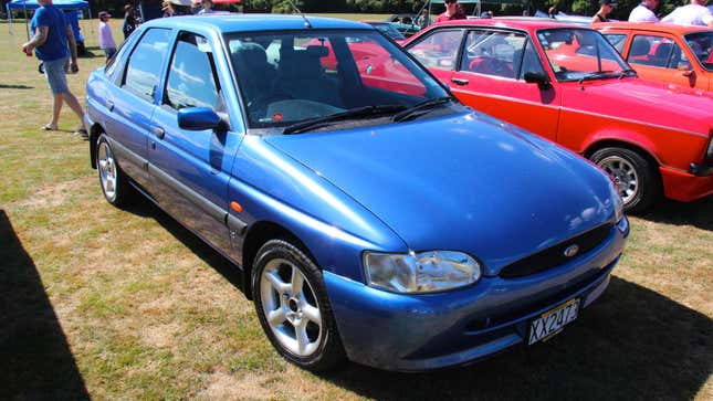 A blue Ford Escort hot hatchback. 