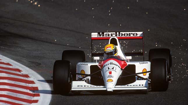 A photo of a red and white McLaren Formula 1 car.