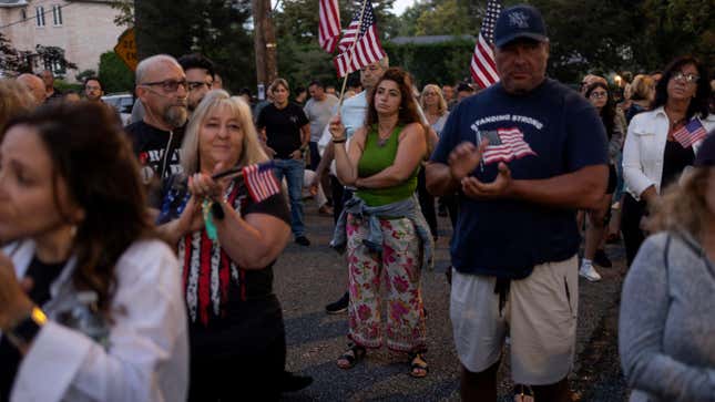 Neighborhood residents, joined by anti-migrant activists, hold a 5th demonstration and rally to protest the city housing migrants at a closed Catholic school, St. John Villa Academy, September 14, 2023, in the Arrochar neighborhood of Staten Island, New York. 