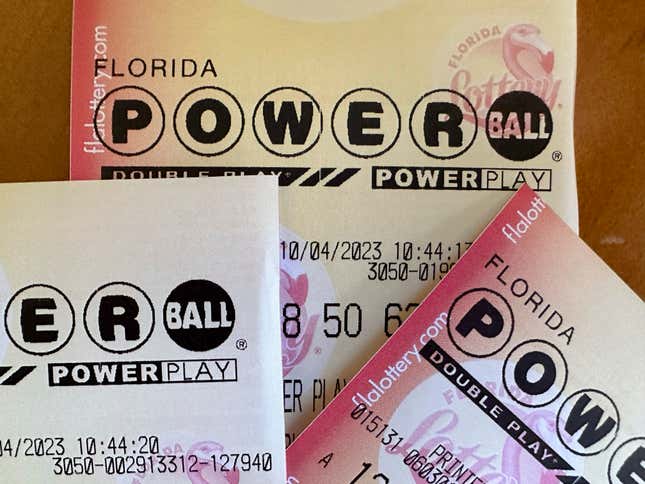 FILE - Powerball lottery tickets are displayed Oct. 4, 2023, in Surfside, Fla. An estimated $1.4 billion Powerball jackpot that has been growing since July is about to be on the line. Saturday night’s jackpot is the world’s fifth-largest lottery prize after rolling over for 33 consecutive drawings. (AP Photo/Wilfredo Lee, File)