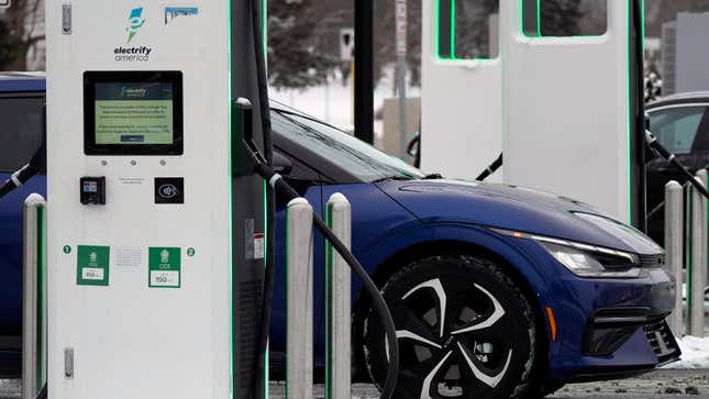 A Kia EV6 charges at an Electrify America charging station.