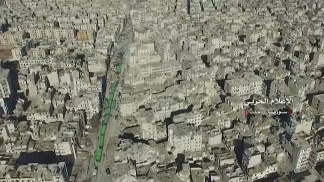 A still image from video taken December 15, 2016 over eastern Aleppo shows an operation to evacuate thousands of civilians and fighters in buses. (Reuters/ Syrian Army Handout)